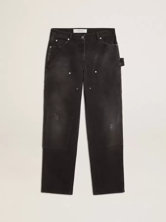 Zwarte katoenen damesjeans met slijtage-effect en patches aan de voorkant