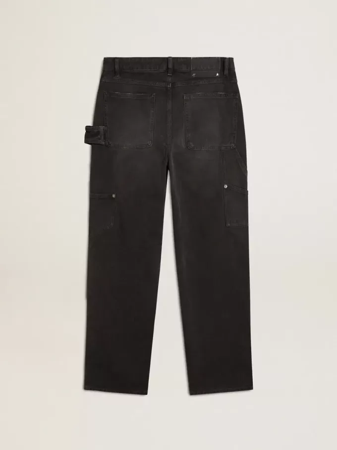 Zwarte katoenen damesjeans met slijtage-effect en patches aan de voorkant