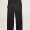 Zwarte katoenen herenjeans met versleten effect en patches aan de voorkant