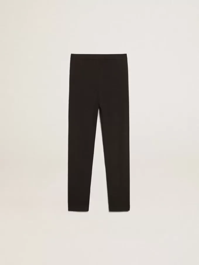 Zwarte legging voor meisjes met witte sterren aan de zijkanten