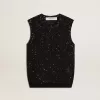Zwarte mesh-top met pailletten en contrasterende details