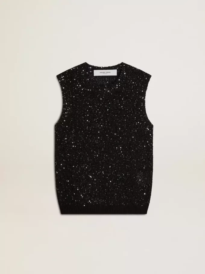 Zwarte mesh-top met pailletten en contrasterende details