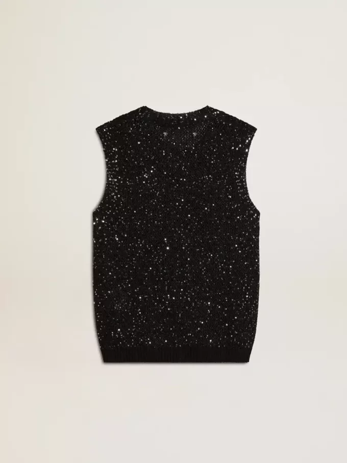 Zwarte mesh-top met pailletten en contrasterende details